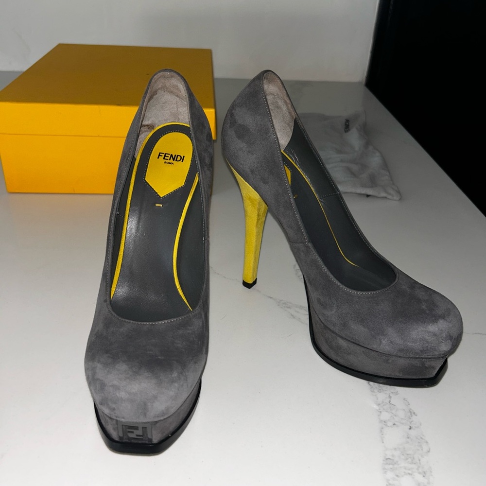 Suede gray Fendi platforms with neon yellow heels.